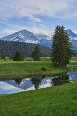 mountains reflecting on the lake surface 
