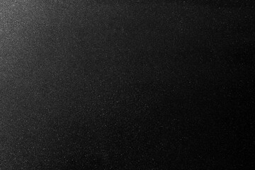 Black metallic textured surface