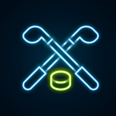Glowing neon line Ice hockey sticks and puck icon isolated on black background. Game start. Colorful outline concept. Vector