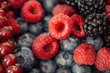 Background from different berries, raspberries, blueberries and blackberries.