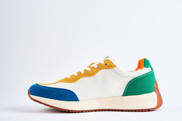 Sport sneakers against white background, Casual trendy shoes closeup, Creative minimal design with copy space