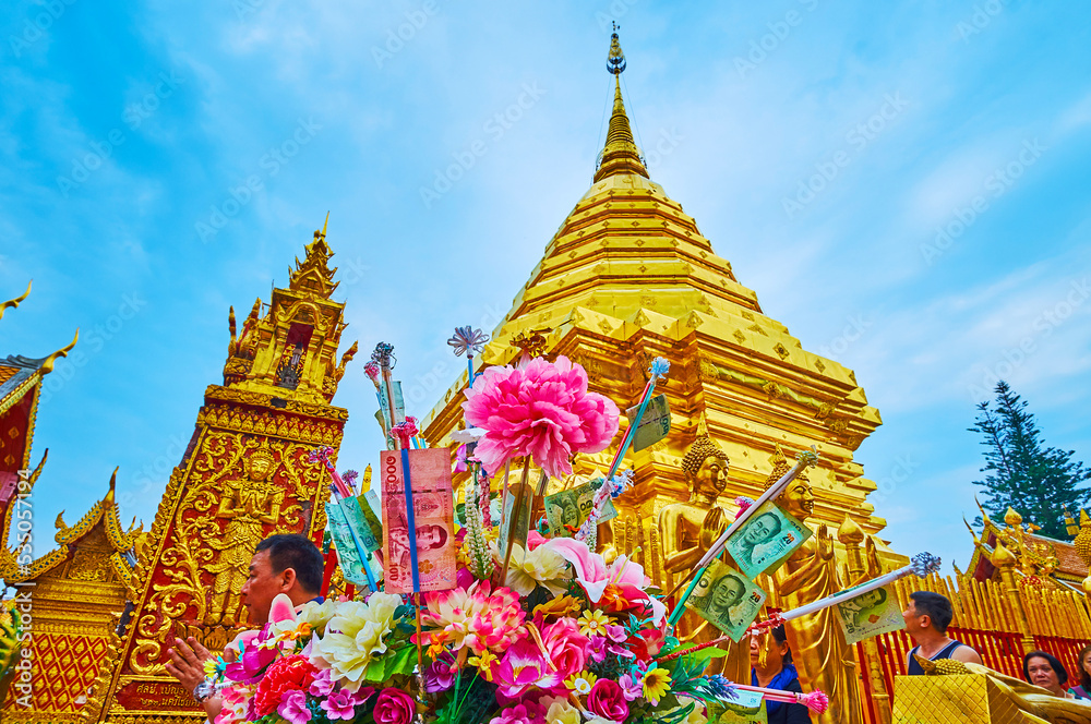 Sticker Flower and money offerings in Wat Phra That Doi Suthep temple, Chiang Mai, Thailand