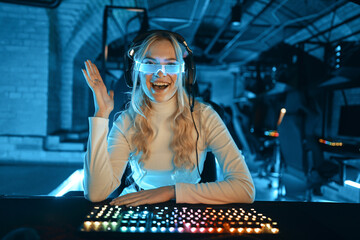 A young e-athlete is greeted via webcam.