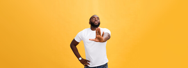 Fototapeta na wymiar Portrait shock and annoyed displeased young man raising hands up to say no stop right there isolated orange background. Negative human emotion, facial expression, sign, symbol, body language