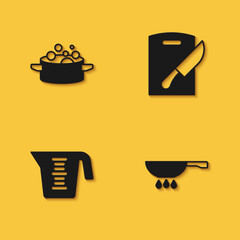 Set Cooking pot, Frying pan on fire, Measuring cup and Cutting board and knife icon with long shadow. Vector
