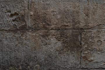 Old brick wall with ruined bricks. Aged grunge wall background. Vintage Texture. Vertical Web banner or Wallpaper With Copy Space for design.