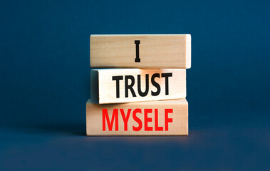 I trust myself symbol. Concept words I trust myself on wooden blocks. Beautiful grey table grey background. Business, psychological and I trust myself concept. Copy space.