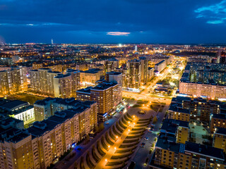 Panorama night city Kazan. View of the new quarters of new buildings in the evening illumination