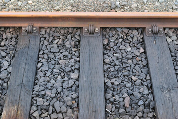 Old Railway Track and Stone Ballast with Timber Sleepers in Close Up