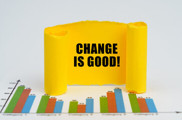 Against the background of the graphs, a yellow paper plate with the inscription - Change is Good