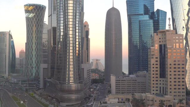 Doha, Qatar- May 5,2022 : Doha skyline with many towers during the night.