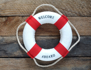 WELCOME word on the lifebuoy.