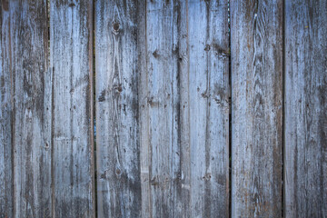 Old gray wooden boards close-up.