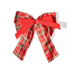 Red holiday bows on white background
