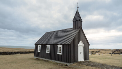 Black church on the peninsula Snafellsnes , Budakirkja,Budir church in Iceland