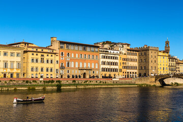 Fototapeta na wymiar Florence, Italy. Picturesque embankment of the Arno River near the Santa Trinita Bridge