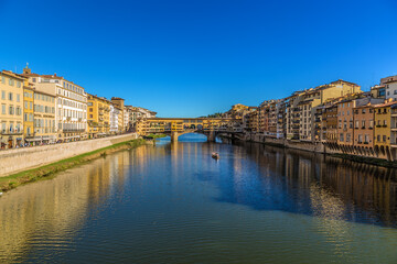 Fototapeta na wymiar Florence, Italy. Scenic view of the Arno river and the Ponte Vecchio bridge