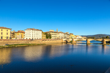 Florence, Italy. Embankment of the Arno river and the Ponte alle Grazie bridge