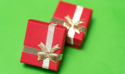 Small gift boxes with bows. Christmas tree decorations. Christmas Eve gifts.