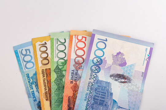 Kazakhstan money - tenge. 500, 1000, 2000, 5000, 10000 banknotes. Close up of tenge on white background.