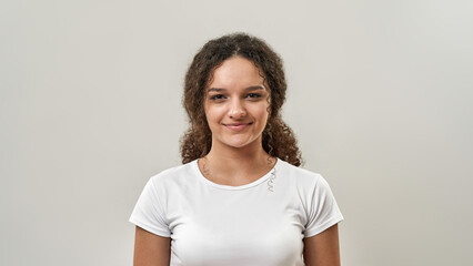 Portrait of smiling teenage girl looking at camera