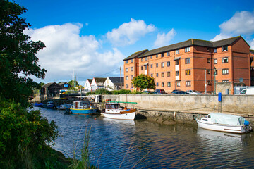 boats on a river on a sunny day