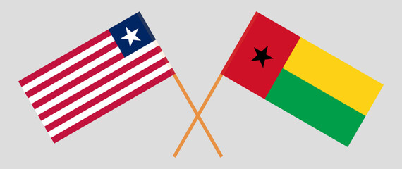 Crossed flags of Liberia and Guinea-Bissau. Official colors. Correct proportion