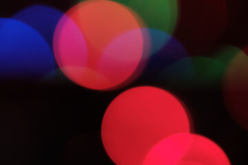 Abstract blurred background of large multicolored spherical highlights