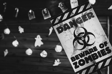 Halloween decoration, danger poster on black and white zombies
