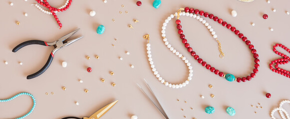 Jewelry making flatlay with semi-precious stone beads and tools. Handmade jewelry, small business,...
