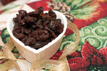 bowl full of raisins - Christmas time - obrazy, fototapety, plakaty