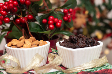 bowl full of almonds and raisins - Christmas season