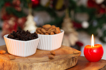 bowl full of almonds and raisins - Christmas time
