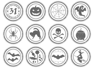 A set of 12 unique grunge stamps, Halloween themed. Each stamp is isolated, grouped, labeled, and on an individual layer.
