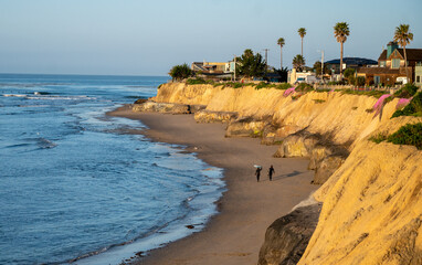 surfers on the beach