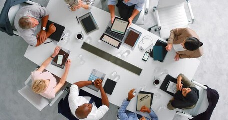View from above of office employees together, planning through communication and collaboration at work for business goals and targets. Teamwork results in corporate productivity, efficiency and focus - Powered by Adobe