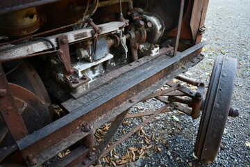 vintage tractor engine with wooden control rail