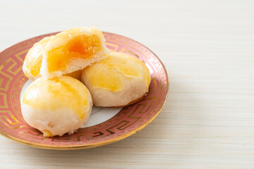 Chinese pastry moon cake with salted egg peanut or Spring Roll pastry with nuts and salted eggs