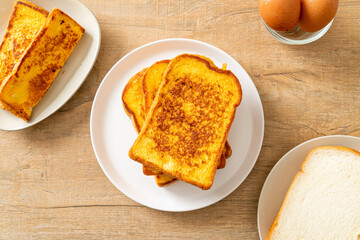 french toast on white plate