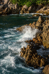 phuket waves on the rocks