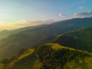 Aerial view of golden rice terraces at Mu cang chai town near Sapa city, north of Vietnam. Beautiful terraced rice field in harvest season in Yen Bai, Vietnam