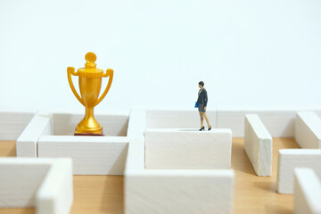 Miniature people toy figure photography. Business solution concept. A businesswoman walking above...