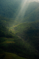 Aerial view of golden rice terraces at Mu cang chai town near Sapa city, north of Vietnam. Beautiful terraced rice field in harvest season in Yen Bai, Vietnam