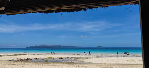 low tide with white sand on the nirvana beach of Baubau city, southeast Sulawesi