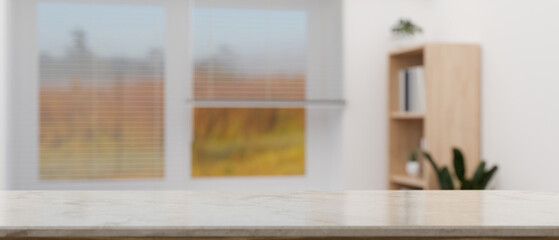 Copy space on tabletop over blurred home living room with landscape view through the window