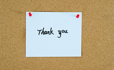 Thank you note on cork board