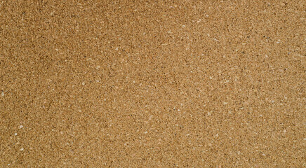 Brown textured cork board closeup