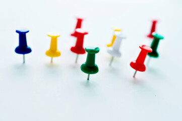 Group of push pins isolated on white