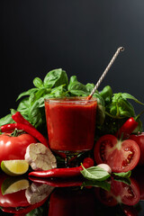Spicy tomato sauce with ingredients.