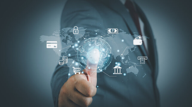 Businessmen scan fingerprints to identify themselves to use Global online financial transactions, future cyber applications, secure access to information, online bank accounts, shopping, pay bills.